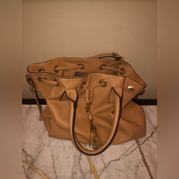 Handbag with black and white stripes inside; classy bag can dress up or down - Picture 1 of 8